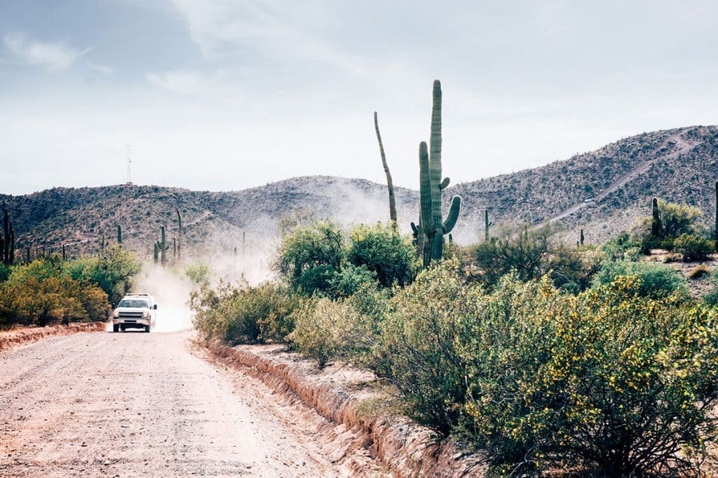 border security vehicle on desert border road