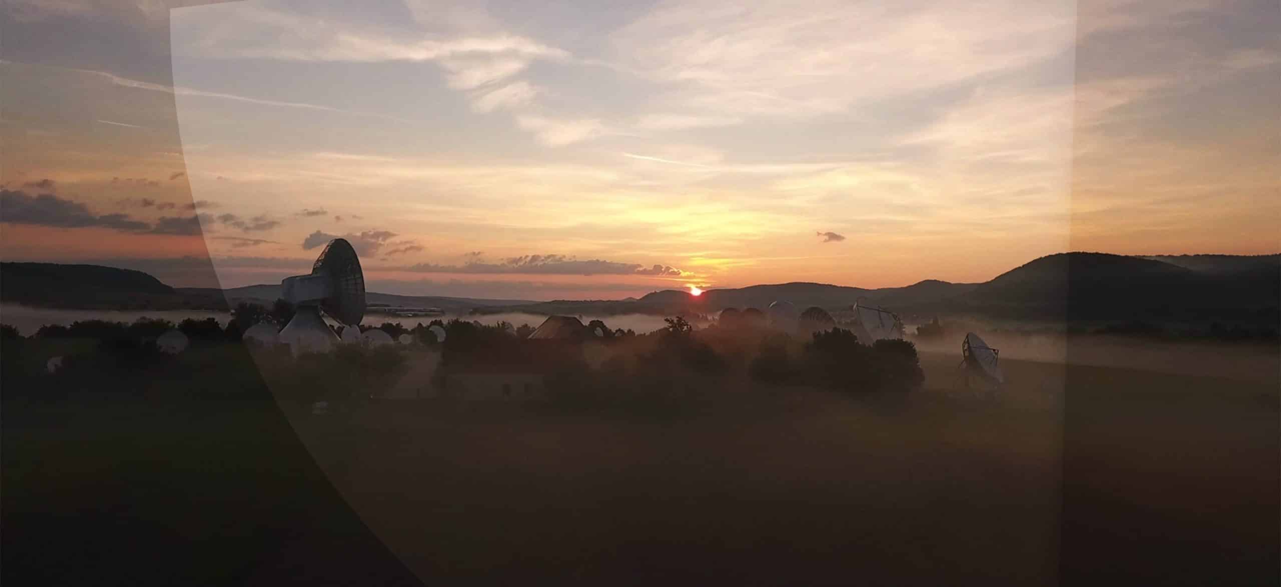 Intelsat global connectivity satellite dishes in remote terrain