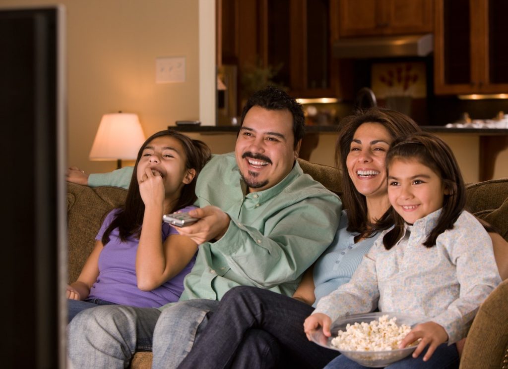 family watching direct tv