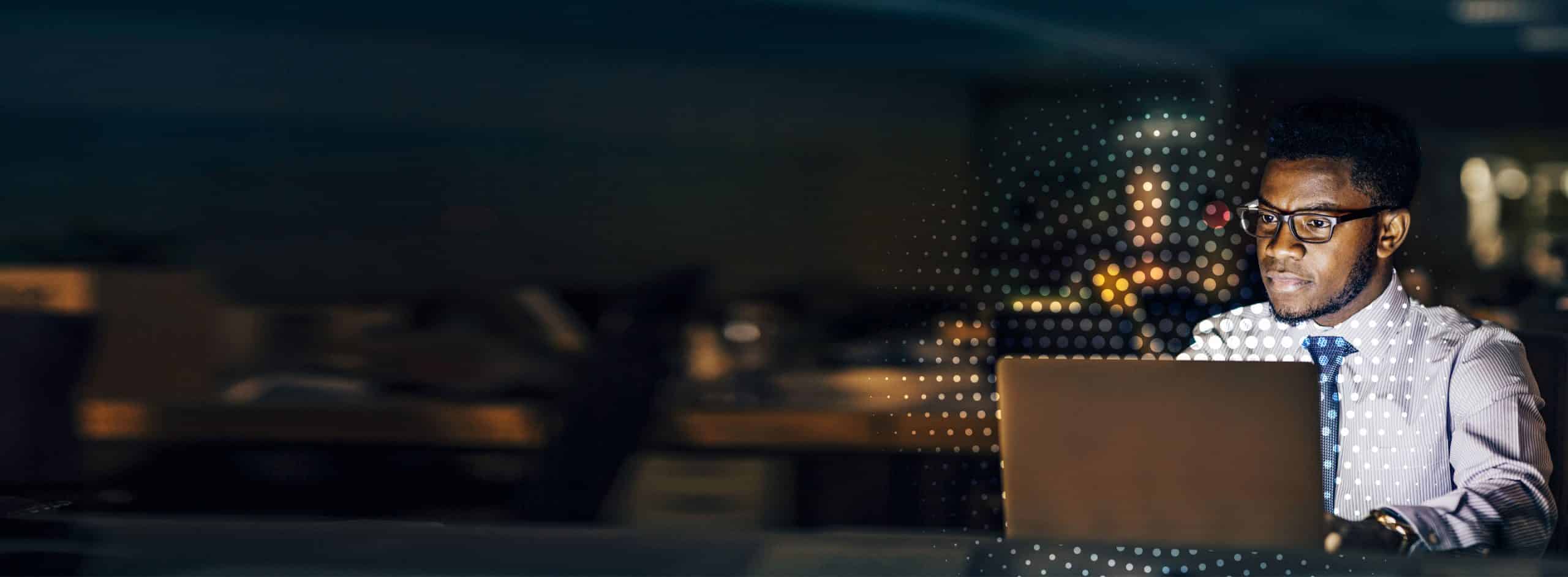 man looking at computer screen