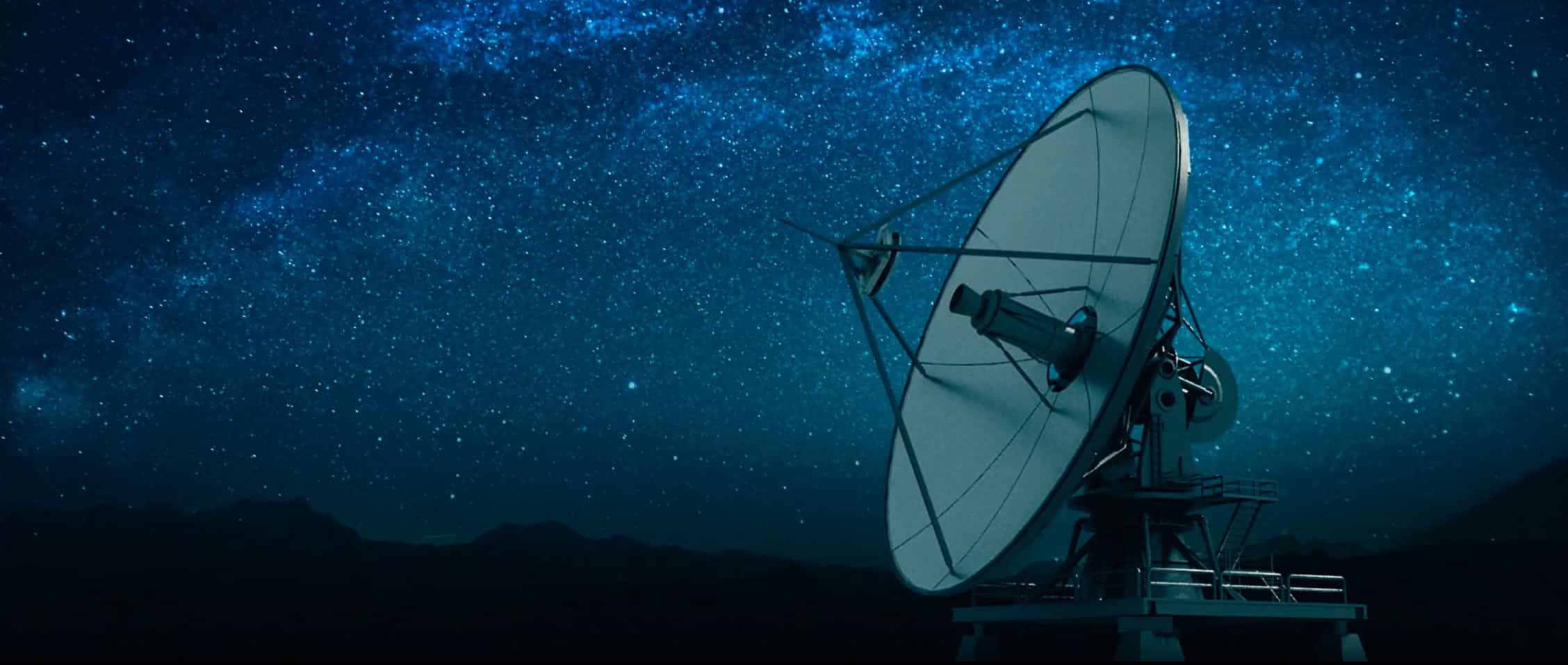 a satellite dish in the night sky