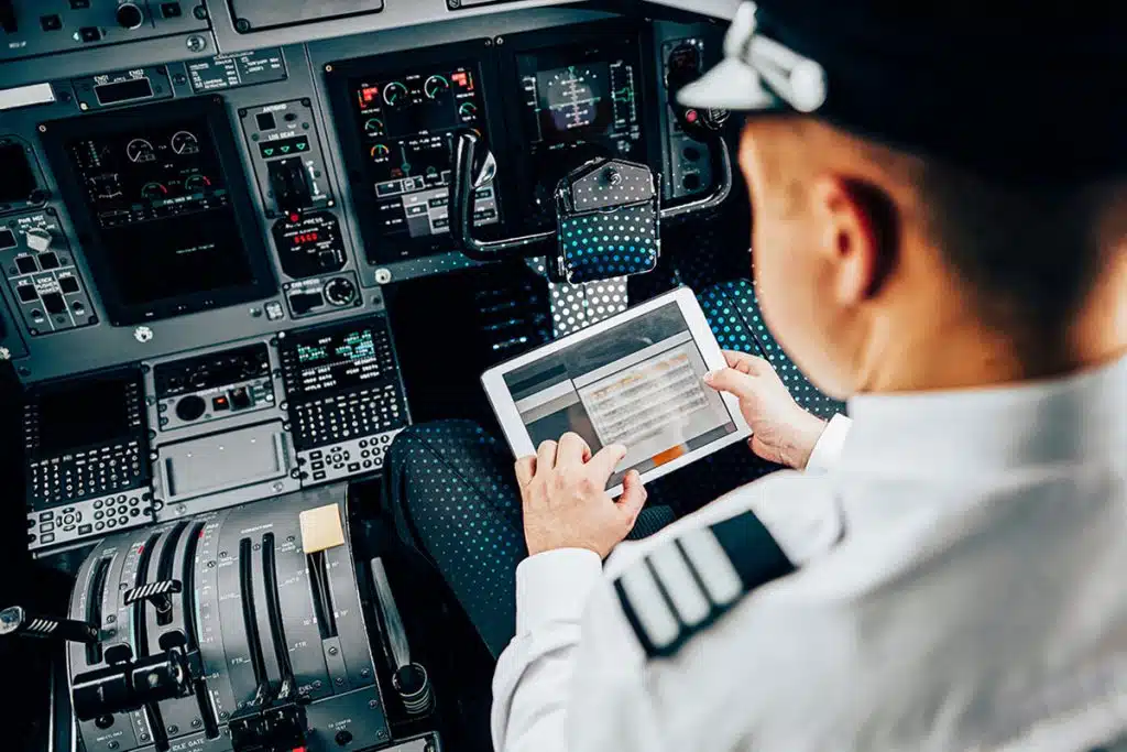 pilot using tablet with inflight connectivity